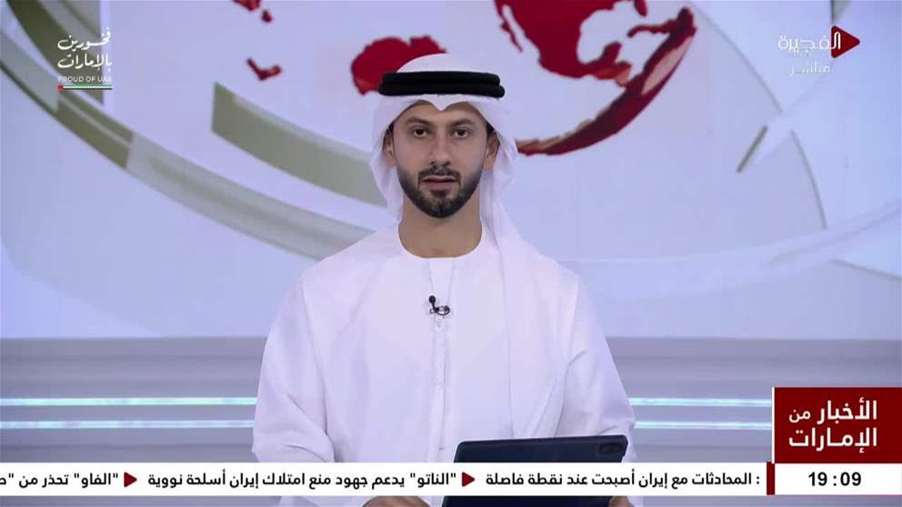عبدالله بن زايد يلتقي المستشار الألماني في برلين